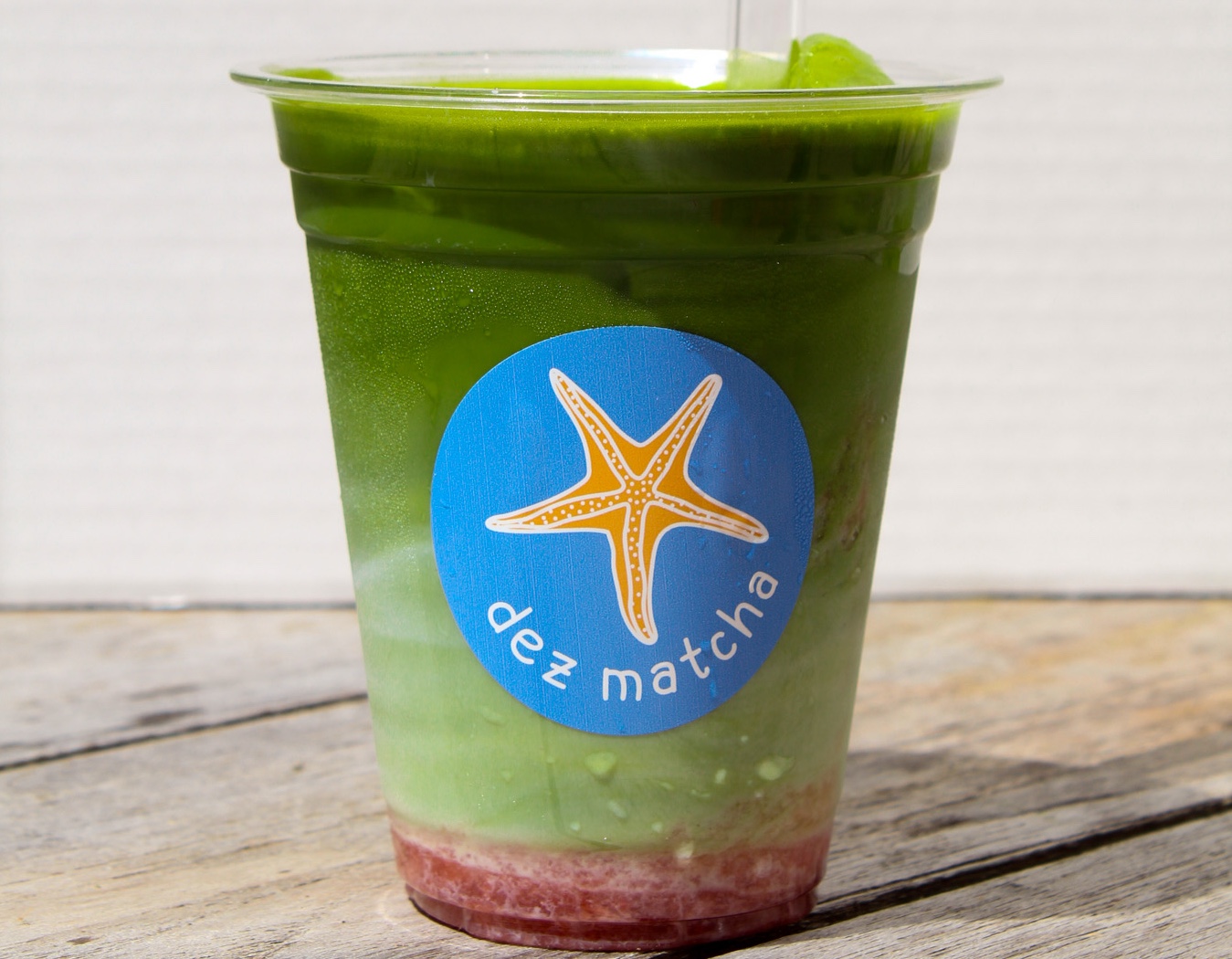strawberry matcha latte stirred